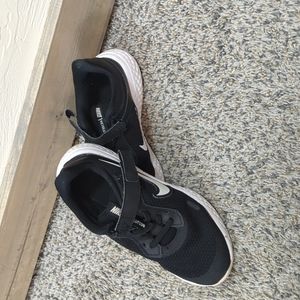 2 pairs of kid nikes